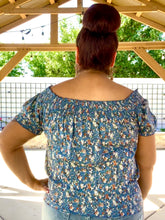 Load image into Gallery viewer, Light Blue Flower Top with Smocking Details - Curvy
